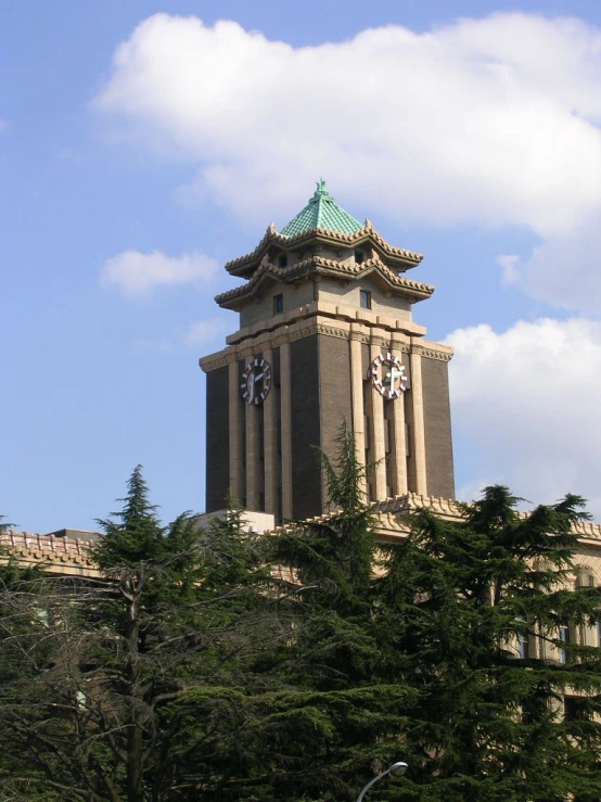 a clock tower has clocks on its sides