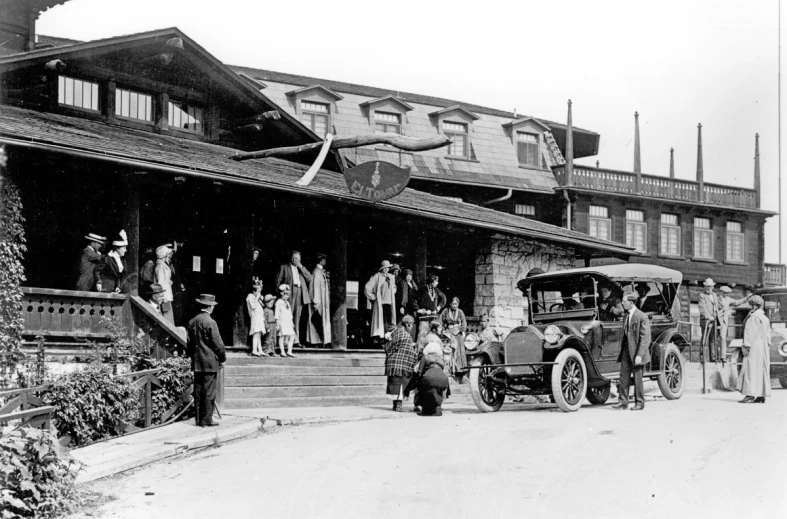 the old fashioned po is of people standing in front of a building