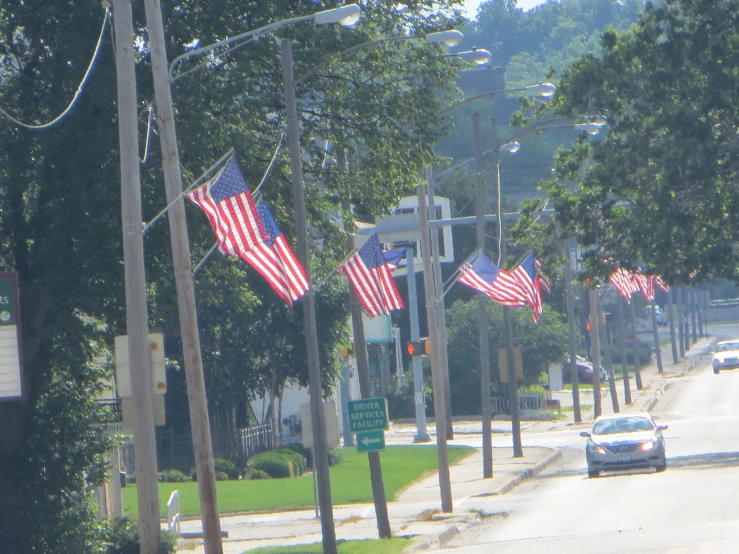 an image of a street scene with flags