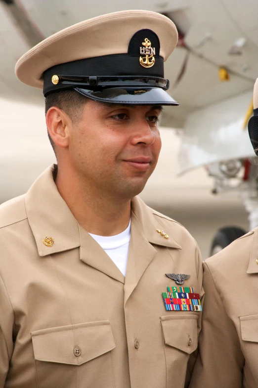 two military men standing next to each other