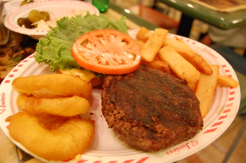 a plate with burger and fries on it