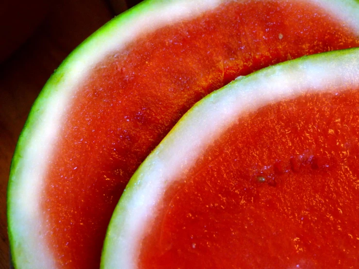 close up of two slices of watermelon