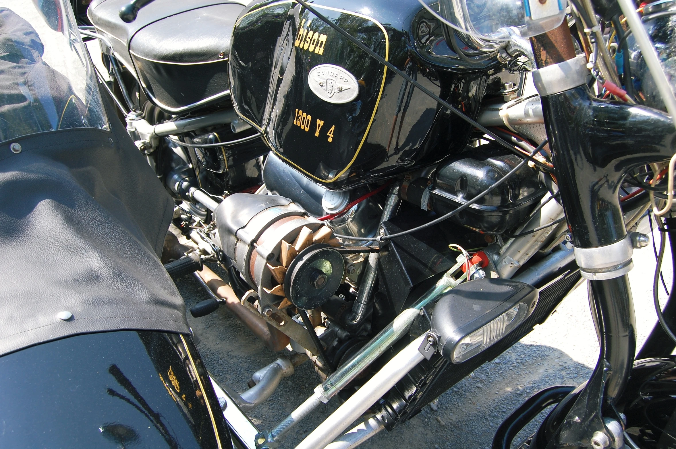 an older model motorcycle on display at a show