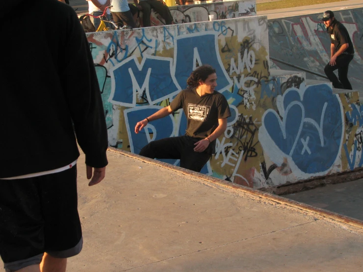 there is a male skate boarder riding his skateboard