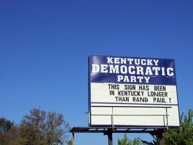 sign at a political party called kentucky, stating it is a victory