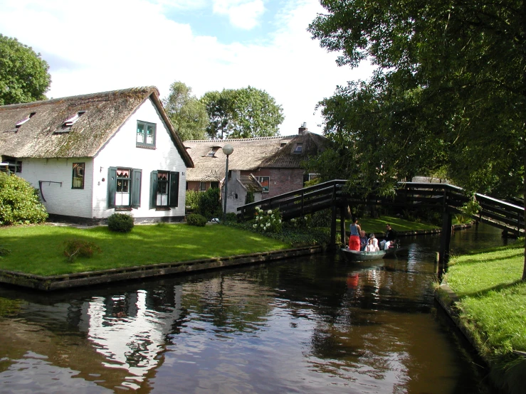 a house that is next to a canal