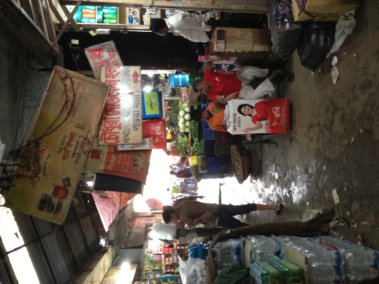 a market filled with lots of people and vendors