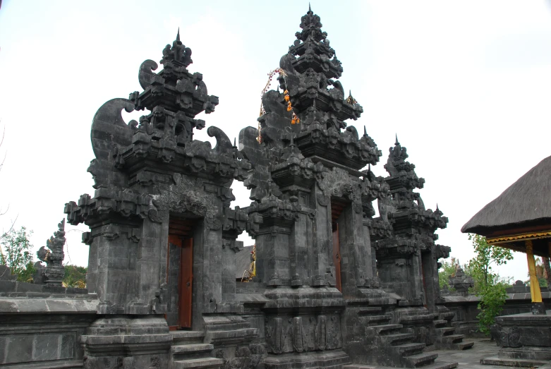 stone carved architecture stands out against a white sky