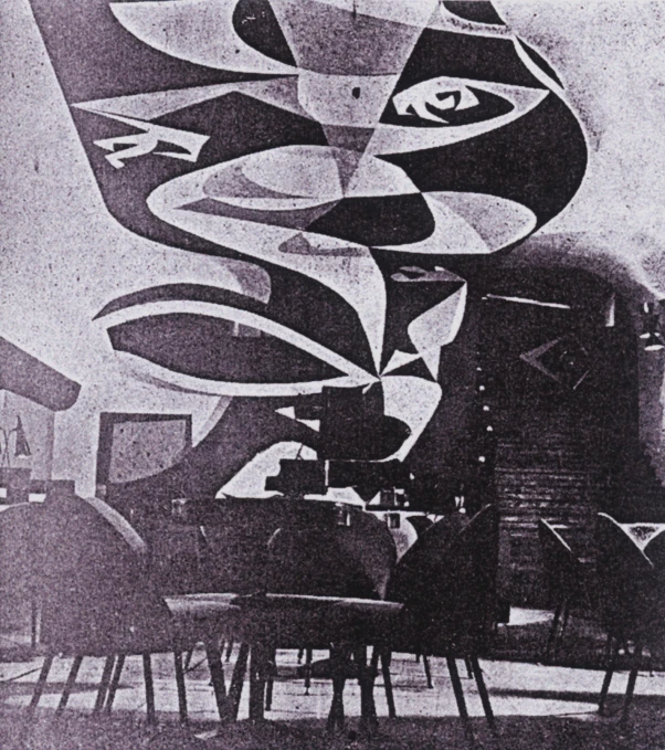 black and white image of people in an art gallery