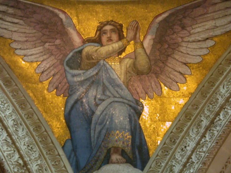 a painting of an angel holding a cross