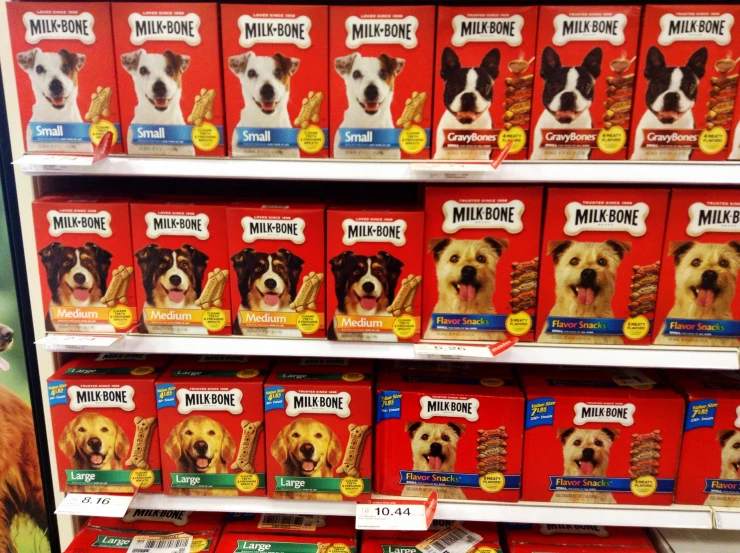 a shelf full of different types of dog treats