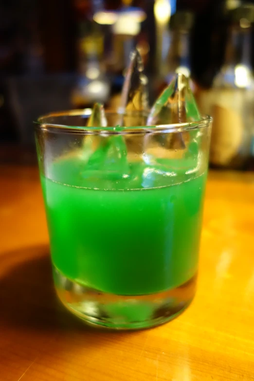 this is an image of a green liquid in a glass