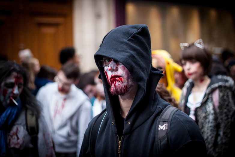 a man with the makeup turned red and white