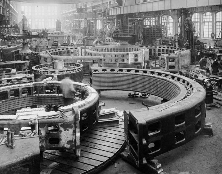 a black and white picture of an assembly line
