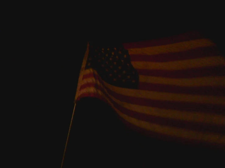 the flag is clearly visible in a black po