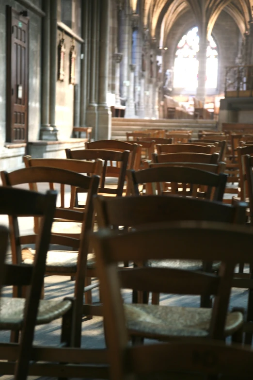 a po of an empty church with lots of chairs