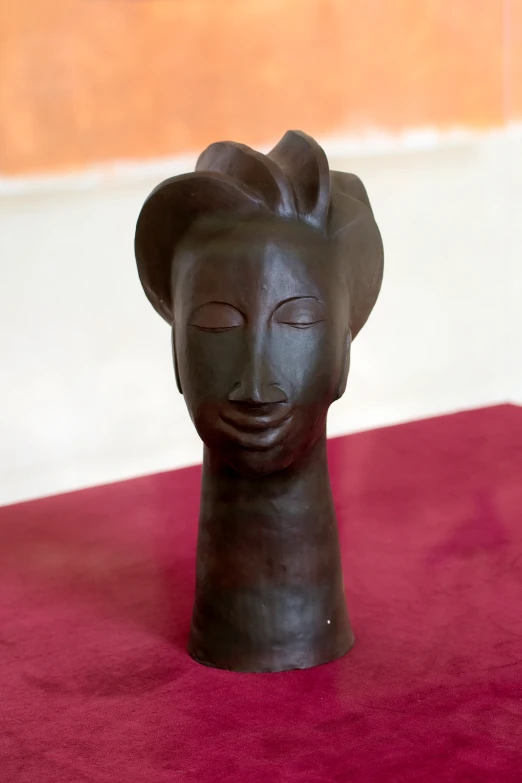 the black face vase has a strange design on it