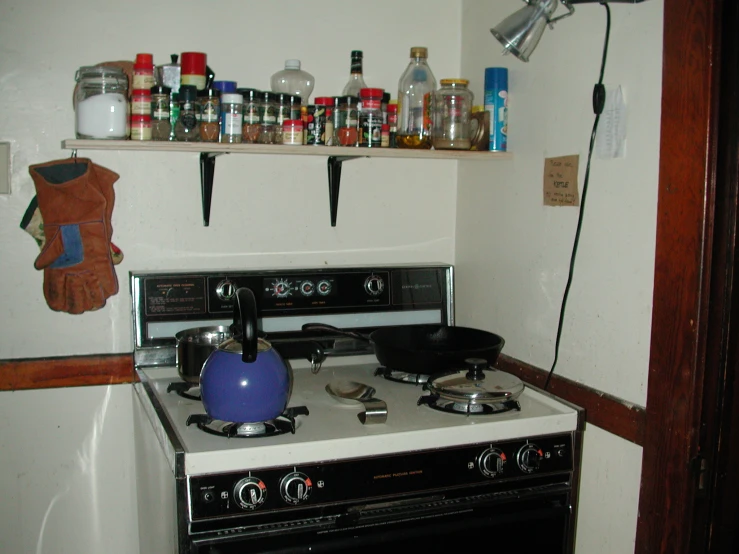 there is a stove and an oven in a room