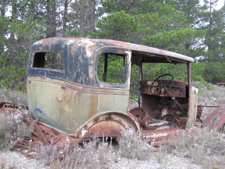 old run down and abandoned truck in the woods