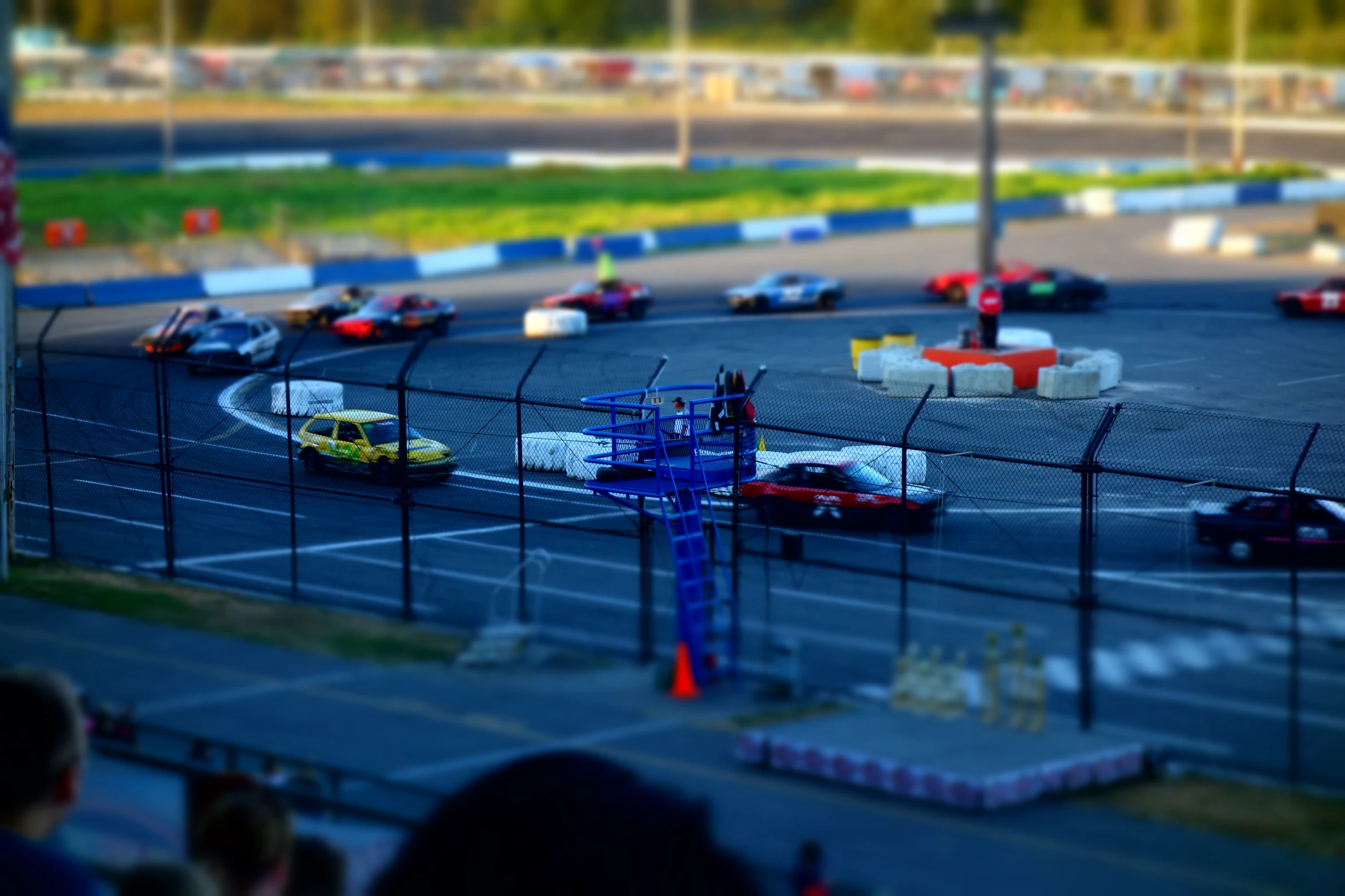 view from a track of cars racing on a track