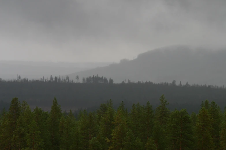 an image of a rain shower in the mountains