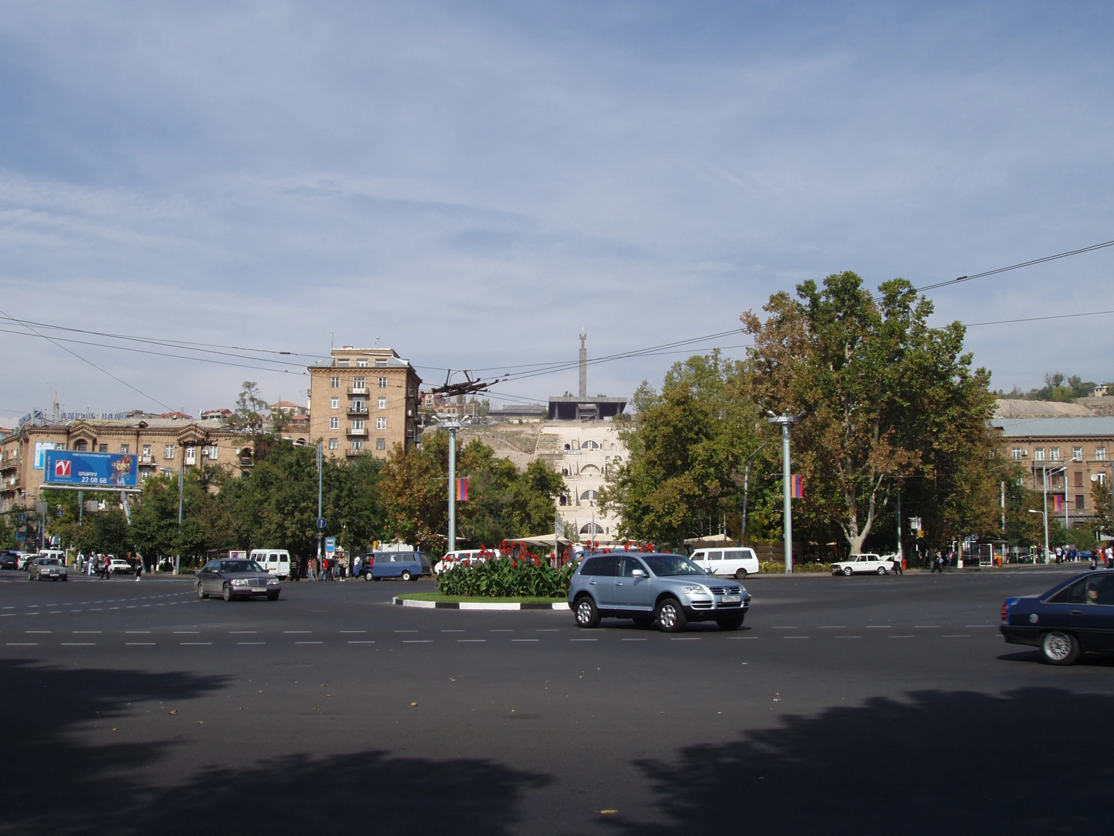 the parking lot of the business complex is mostly empty