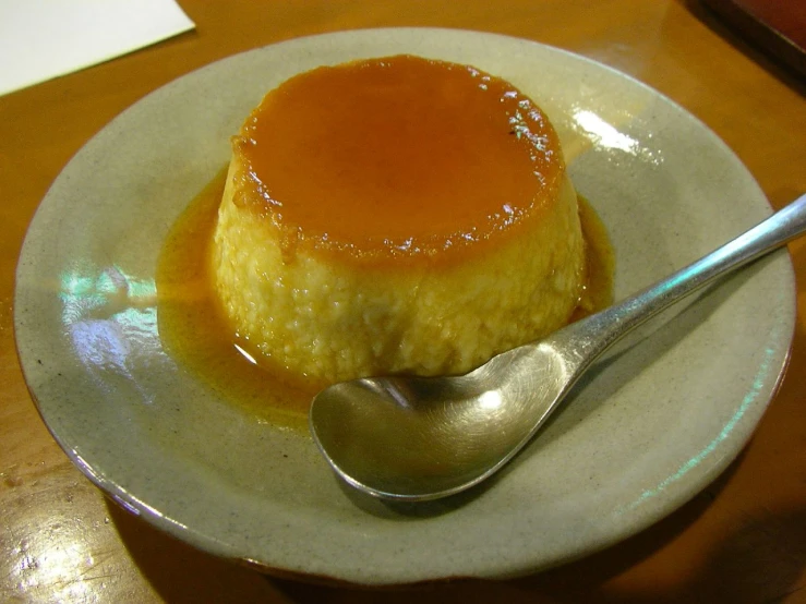 a flan dish that is on a plate