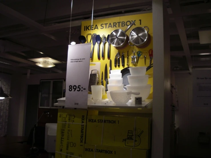 a wall display with various utensils attached to it