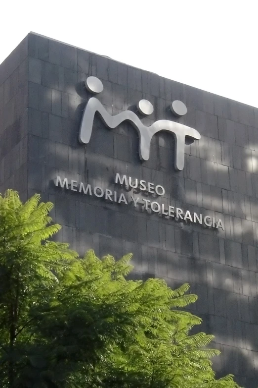 the front facade of a museum and memorial building