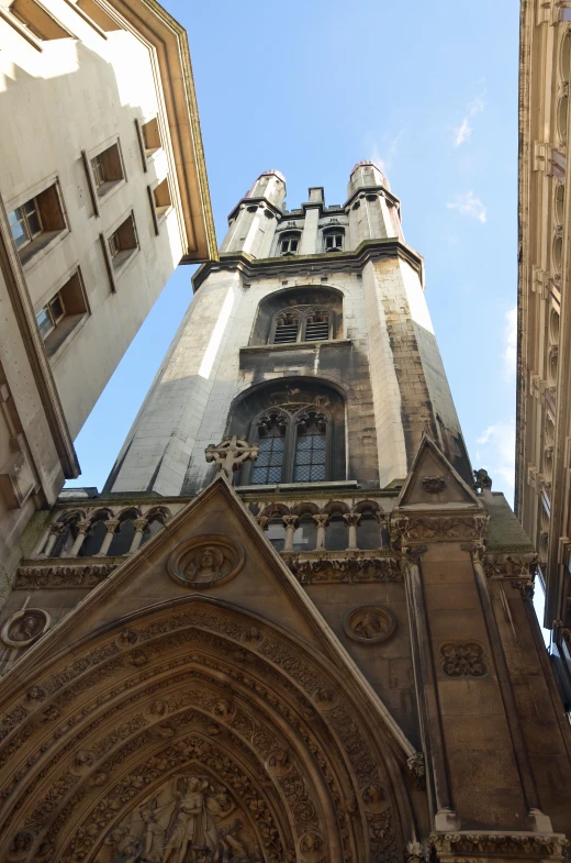 looking up at the top of two cathedrals