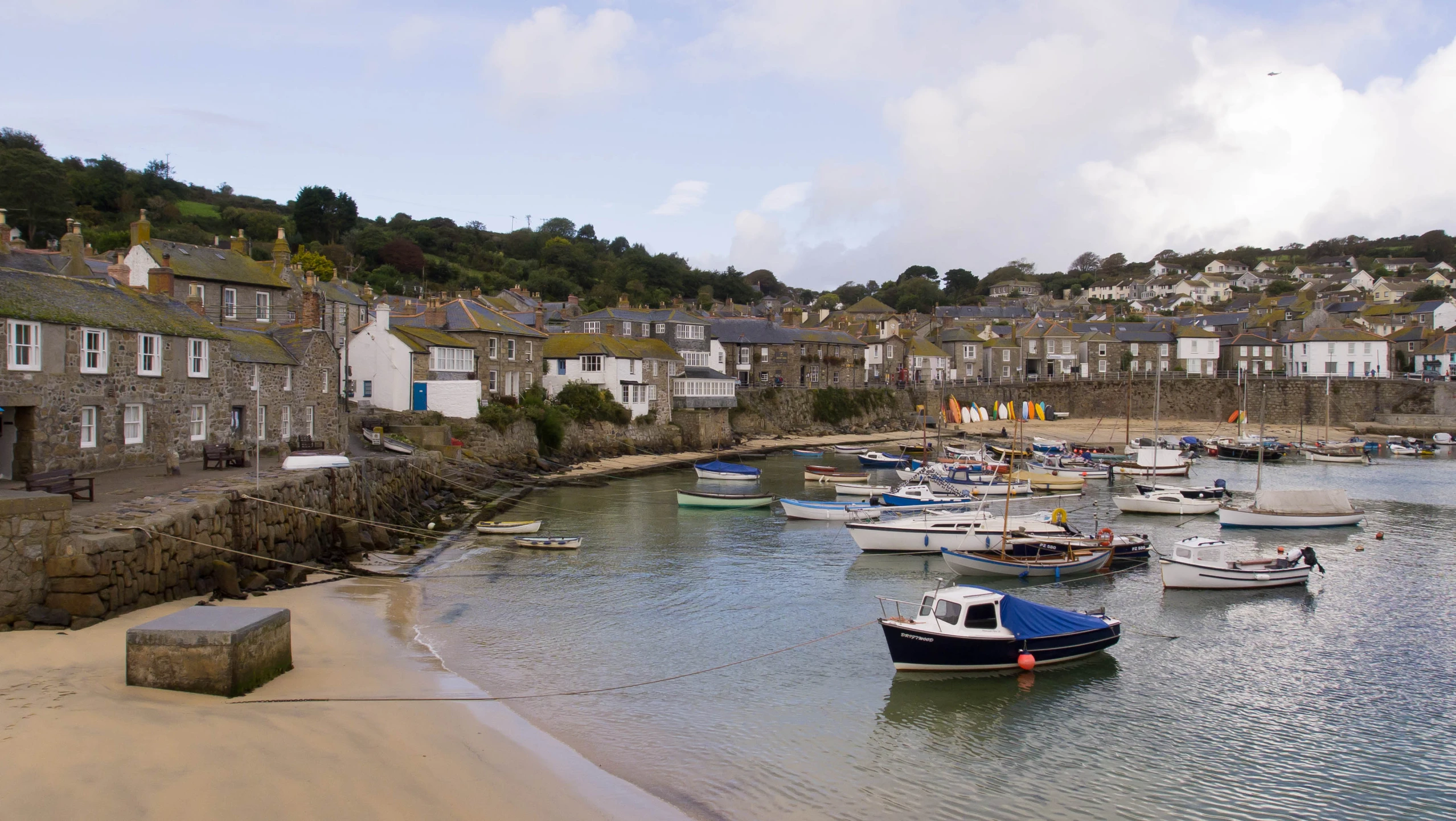 boats in the water at a beach resort