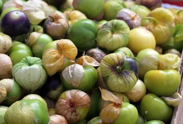 many green and yellow fruits have been picked by someone