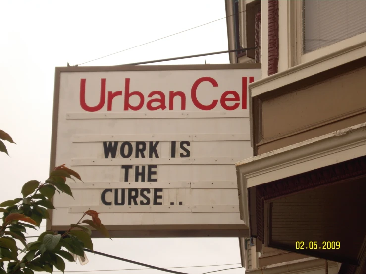 there is an upfront sign advertising a work the course