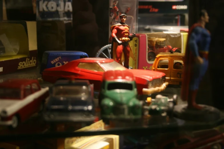 toy cars on a table in a room