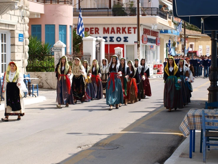 a bunch of people dressed in fancy costumes