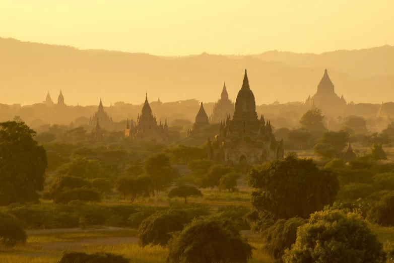 an expansive plain with temples in the distance