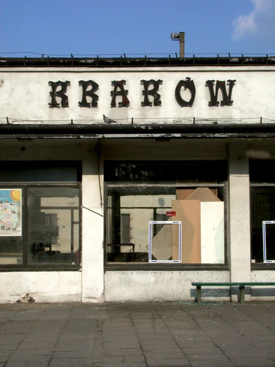 an outside view of a broken down window store