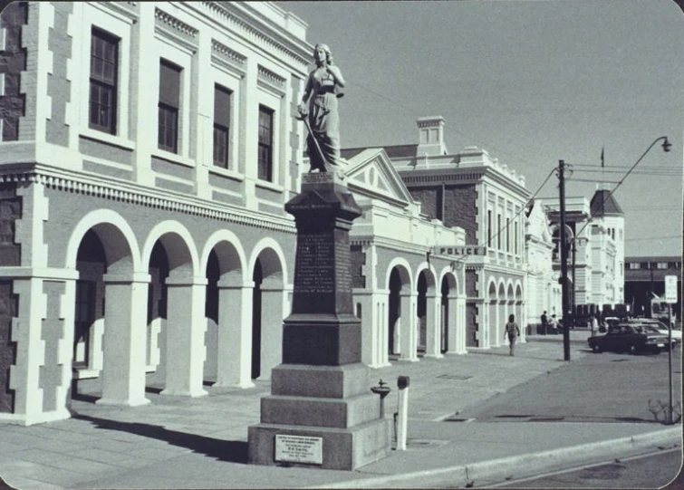 this is a black and white picture of a city street