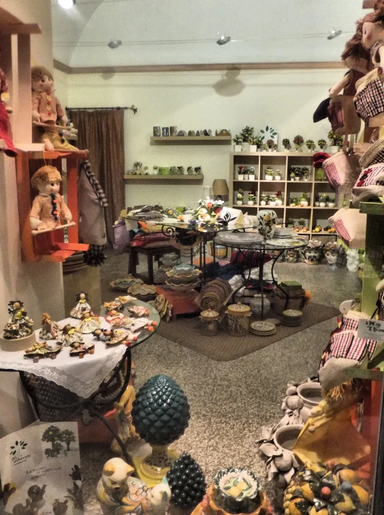 a living room filled with lots of furniture and stuffed animals