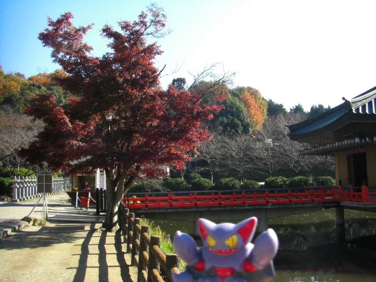 a statue is shown in front of water