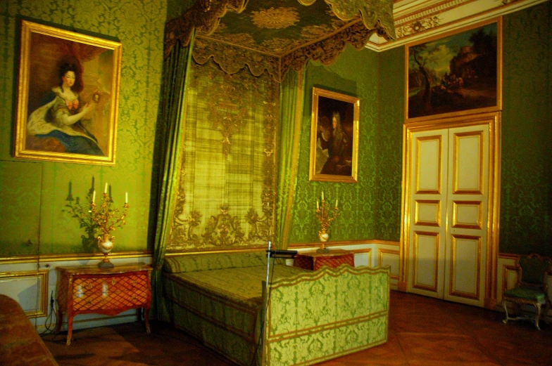 a very fancy looking room with green walls