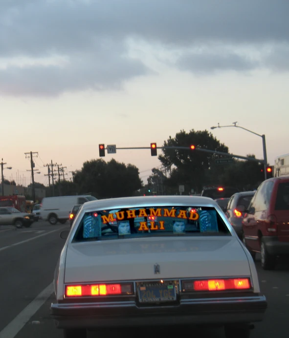 a car with a sign reading summer fling in it's windshield