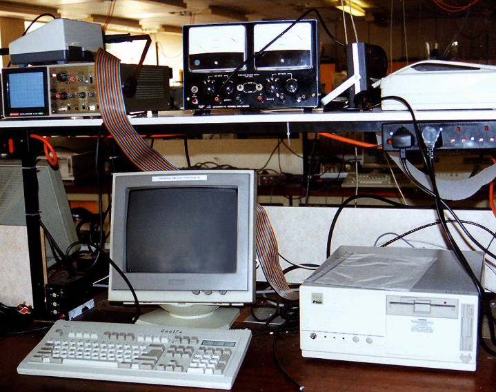 a collection of electronics on top of a table