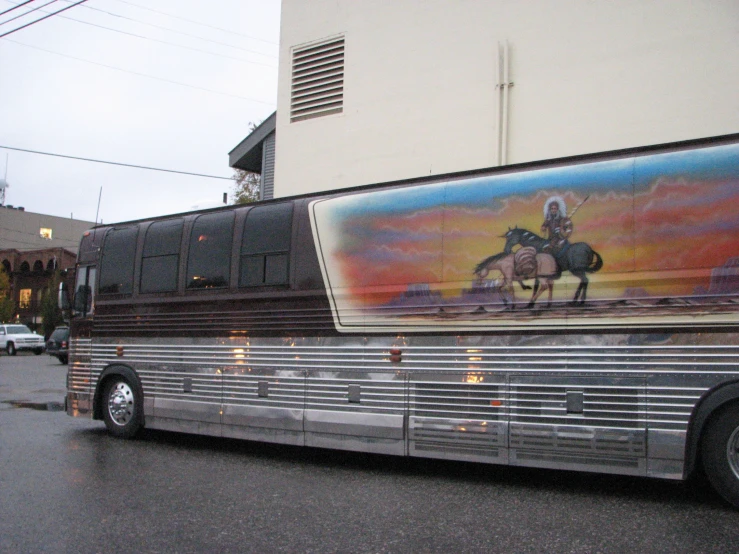 a bus is parked on the side of a street in a town