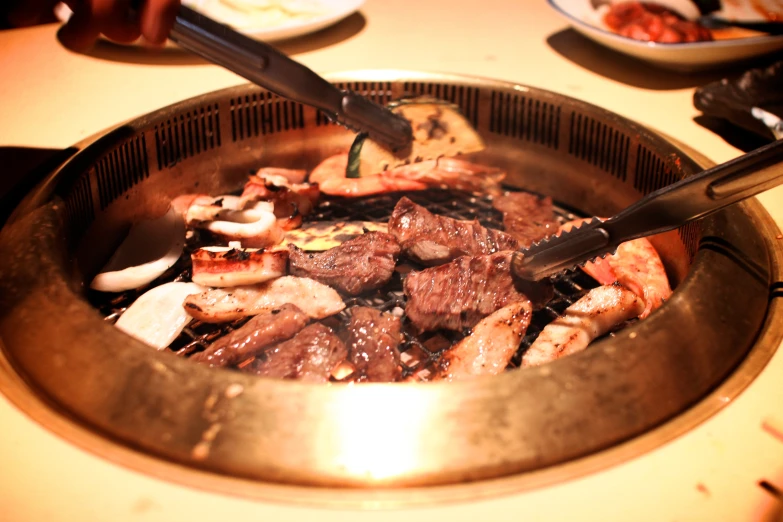 a frying pan that has some very big dogs in it