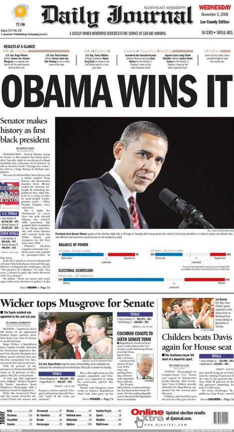 the daily journal is displaying the newspaper with obama winning it