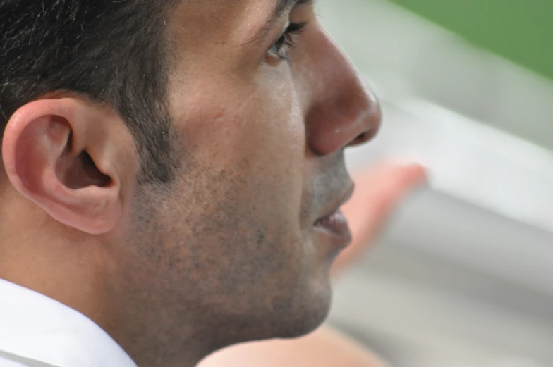 close up of a man with ear to ear ears