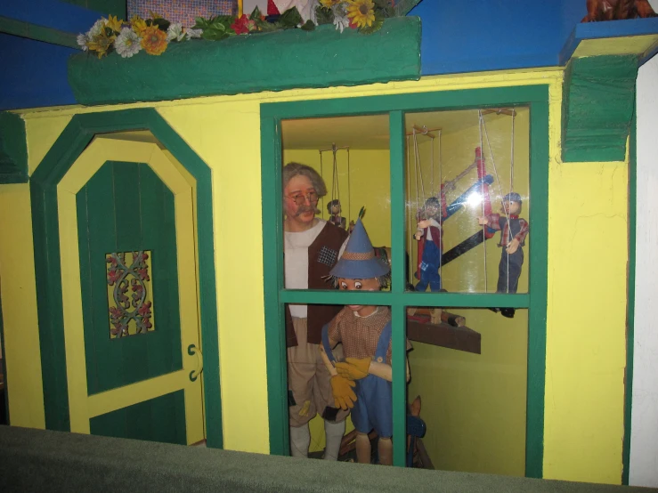 a small building with some decorations and people inside of it