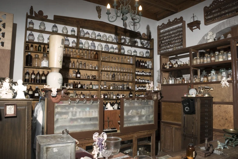 some shelves full of empty bottles and pots