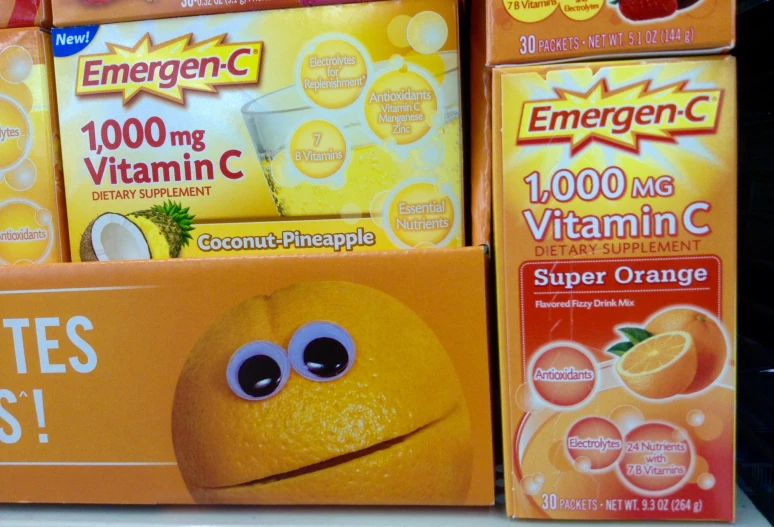 orange juice boxes piled on top of each other